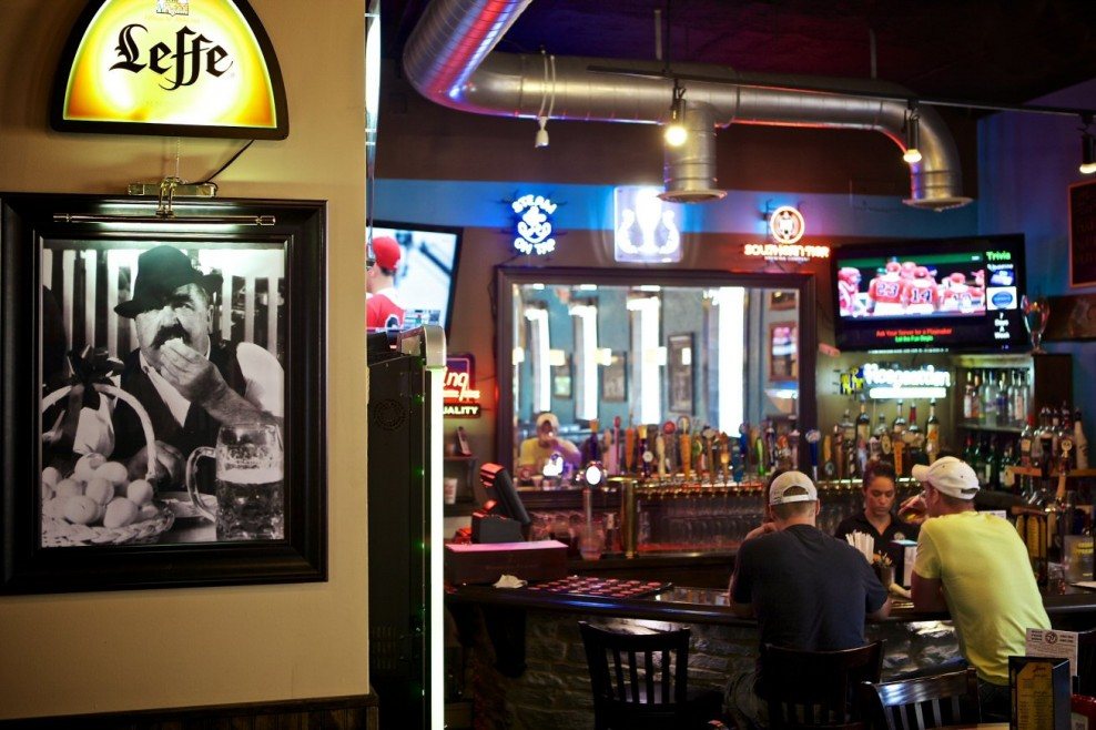 The bar and dining room inside Burger Tavern 77